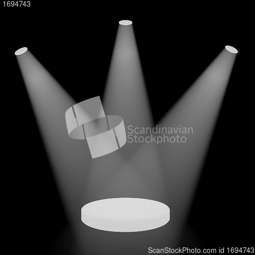 Image of White Spotlights Shining On A Small Stage With Black Background