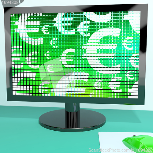 Image of Euro Symbols On Computer Screen Showing Money And Investments