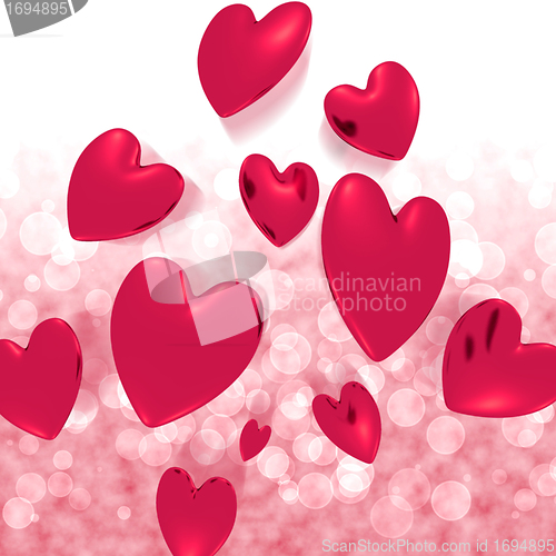 Image of Hearts Falling With Red Bokeh Background Showing Love And Romanc