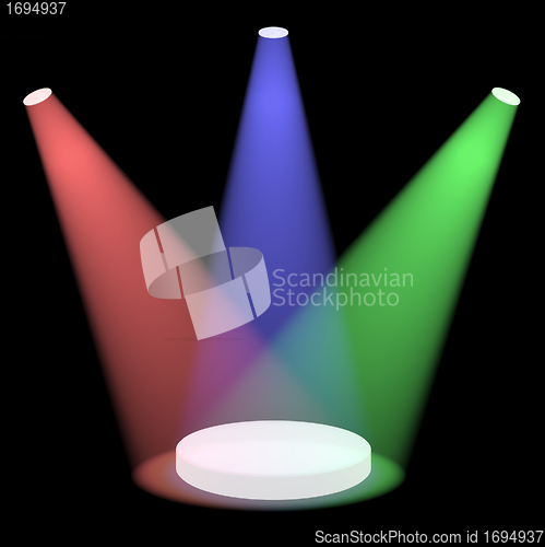 Image of Red Blue And Green Spotlights Shining On A Small Stage With Blac