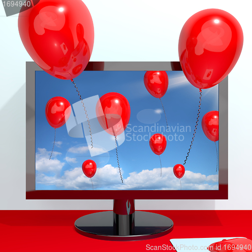 Image of Festive Red Balloons In The Sky And Coming Out Of Screen For Onl