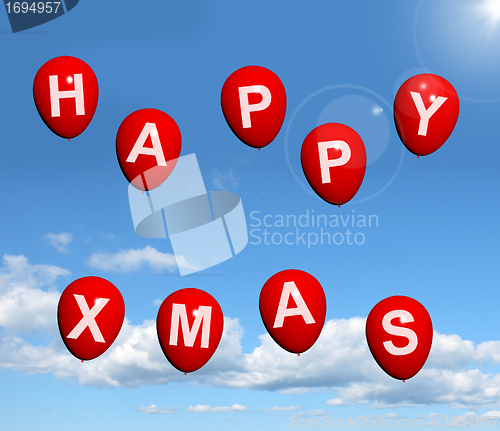 Image of Red Balloons In The Sky Spelling Happy Xmas