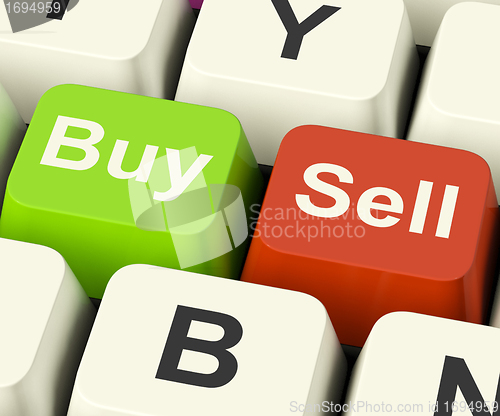 Image of Buy And Sell Keys Representing Business Trade Or Stocks Online