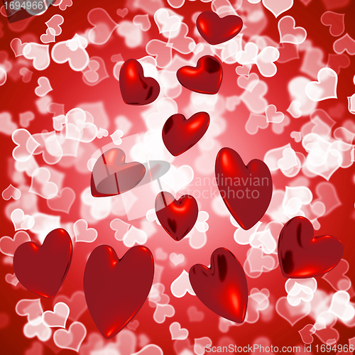 Image of Hearts Falling With Bokeh Background Showing Love And Romance
