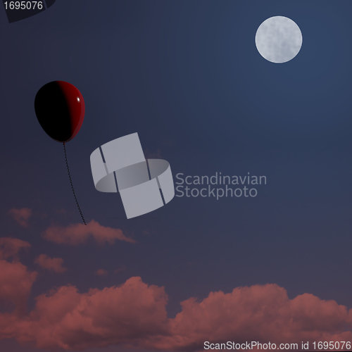 Image of Red Balloon Soaring At Night Representing Freedom Or Being Alone