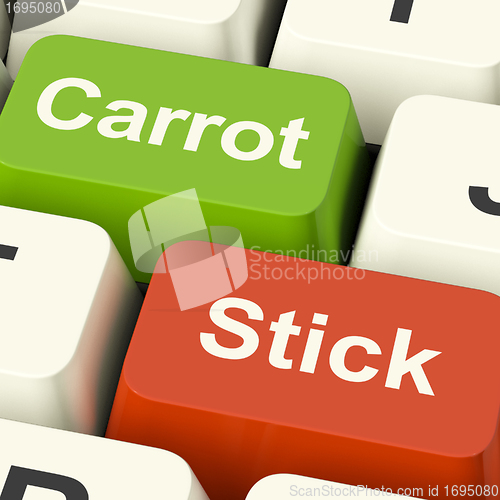 Image of Carrot Or Stick Keys Showing Motivation By Incentive Or Pressure