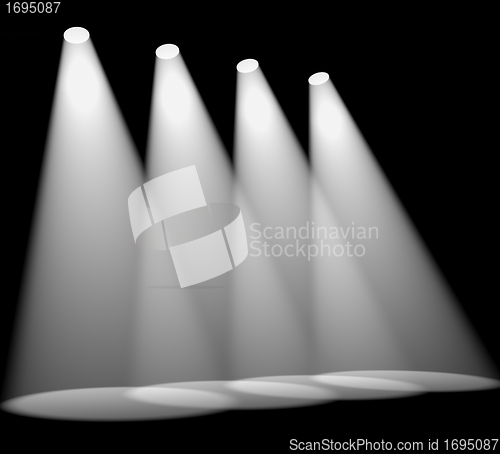 Image of Four White Spotlights In A Row On Stage For Highlighting Product