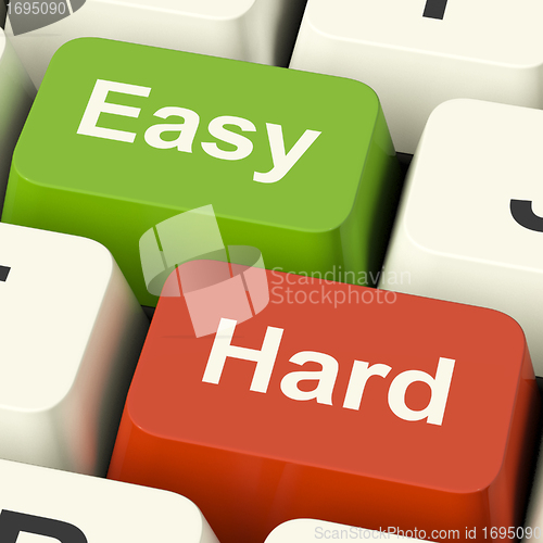 Image of Hard Easy Computer Keys Showing The Choice Of Difficult Or Simpl