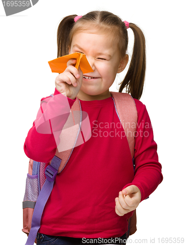 Image of Portrait of a cute schoolgirl with backpack