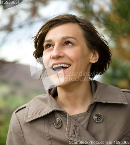 Image of Portrait of a happy beautiful woman