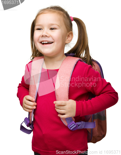 Image of Portrait of a cute schoolgirl with backpack