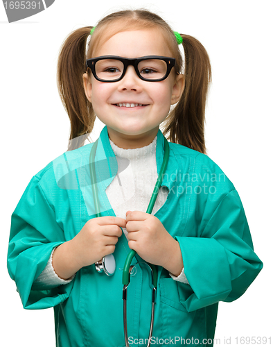 Image of Cute little girl is playing doctor