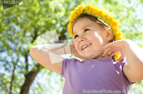 Image of Portrait of a little girl with a wreath