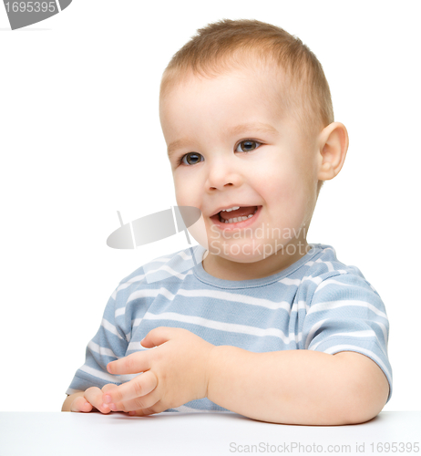 Image of Portrait of a cute and happy little boy