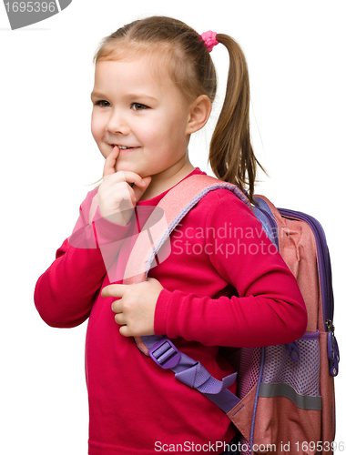 Image of Portrait of a cute schoolgirl with backpack