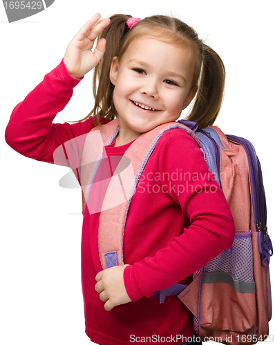 Image of Portrait of a cute schoolgirl with backpack