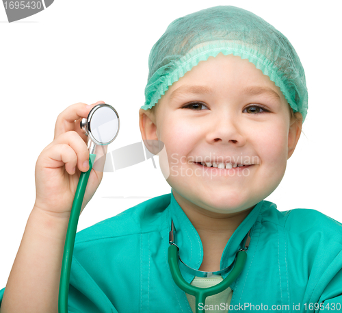 Image of Little girl is playing doctor with stethoscope