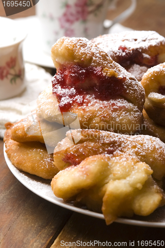 Image of Sweet doughnuts with rose marmelade