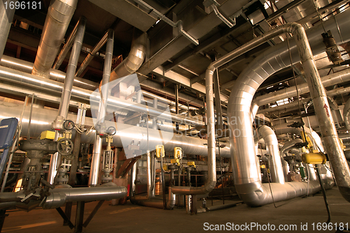 Image of Equipment, cables and piping as found inside of  industrial powe