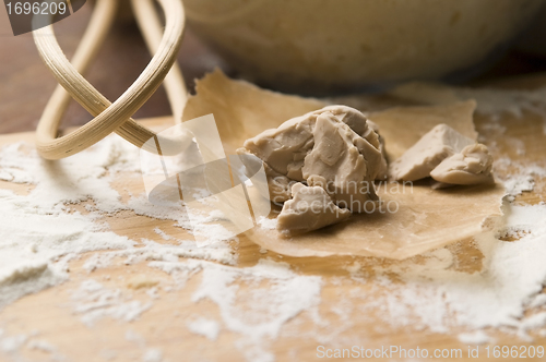 Image of Baker's yeast on wooden board