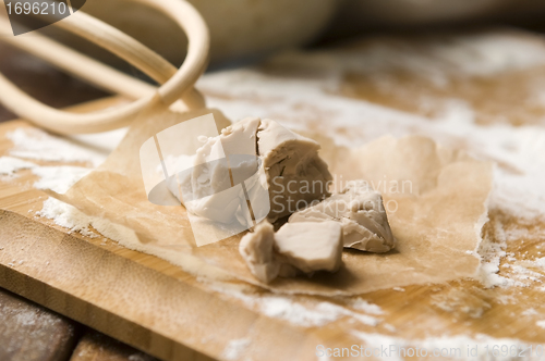 Image of Baker's yeast on wooden board