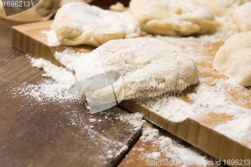 Image of Dough on wooden board