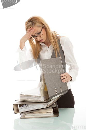 Image of business woman with folder on desk workin isolated on white background