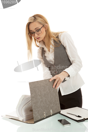 Image of business woman with folder on desk workin isolated on white background