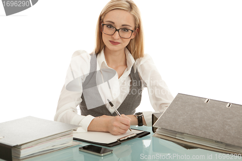 Image of business woman with folder on desk workin isolated on white background