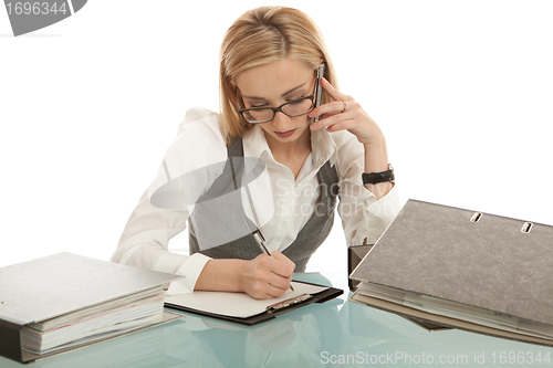 Image of business woman with folder on desk workin isolated on white background