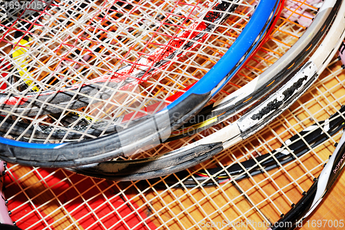 Image of close up of old tennis rackets