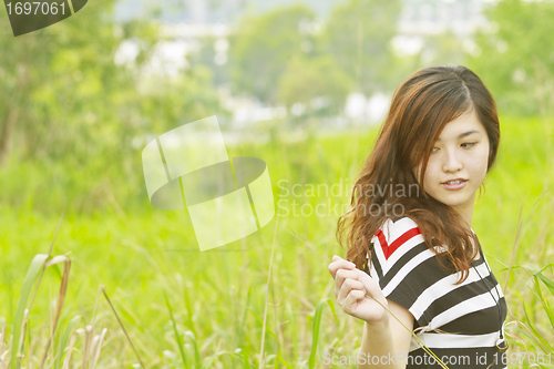 Image of Asian woman in the nature