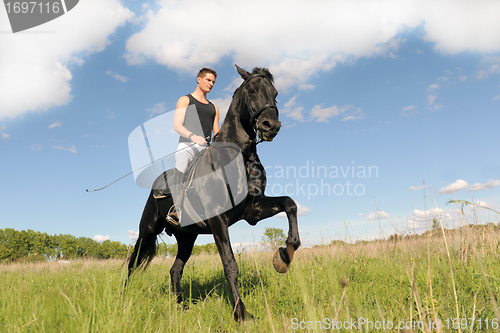 Image of young man and horse