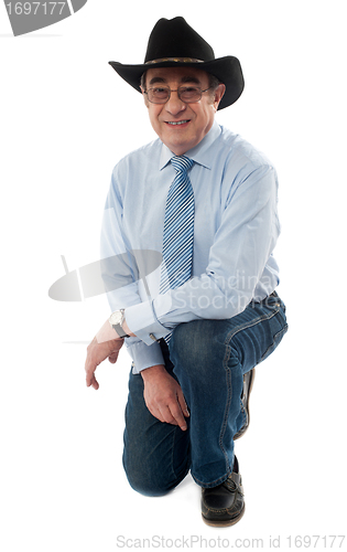 Image of Smiling man wearing cowboy hat