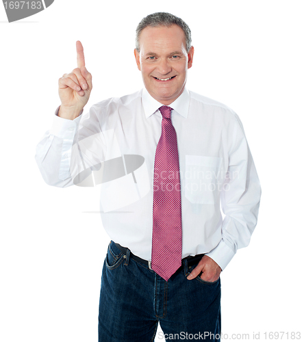 Image of Smart businessperson pointing upwards