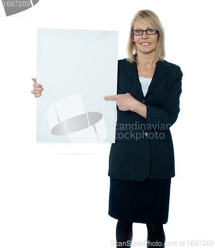 Image of Business woman displaying placard to camera