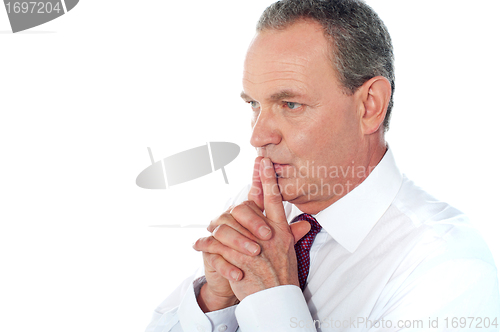 Image of Portrait of thoughtful businessman