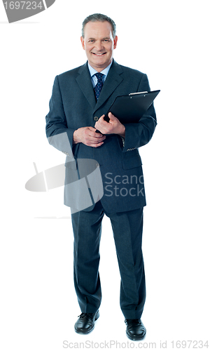 Image of Corporate senior holding business documents