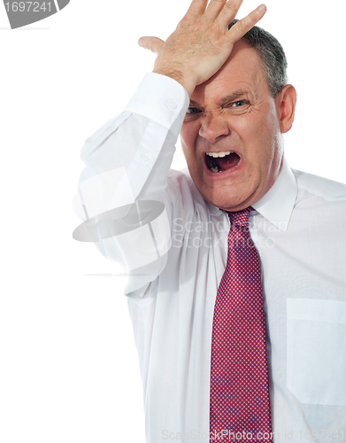Image of Cropped image of a disturbed businessman