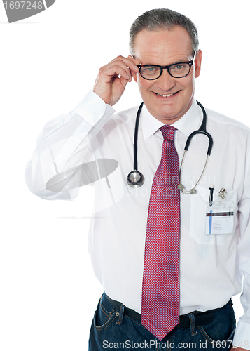 Image of Mature medical professional, indoors studio shot