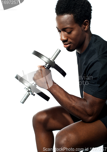 Image of Confident young man working out