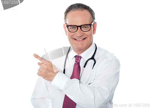 Image of Medical professional pointing away