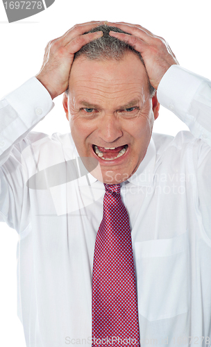 Image of Portrait of businessman expressing frustration