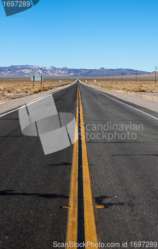 Image of long highway through desert