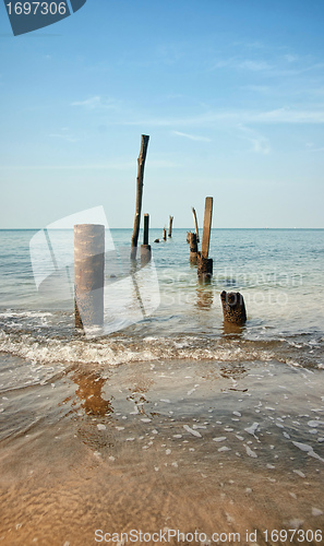 Image of old jetty pillars in sea