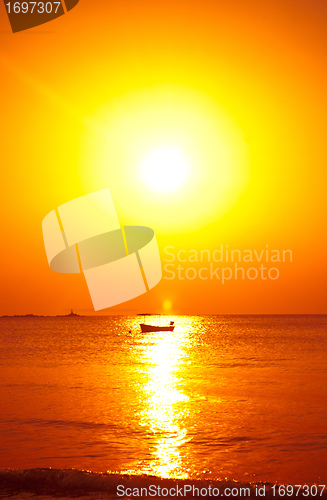 Image of tropical island sunset boat