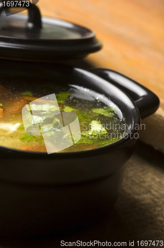 Image of Chicken soup in the ceramic bowl 