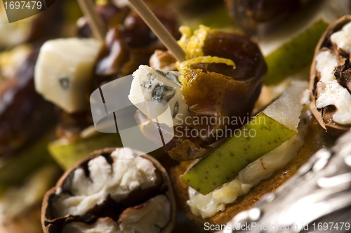 Image of Appetizer Plate with Dactyl, Pecan nuts and Cheese