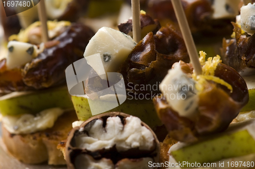 Image of Appetizer Plate with Dactyl, Pecan nuts and Cheese