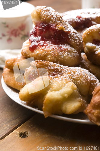 Image of Sweet doughnuts with rose marmelade